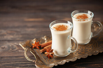 Turkish traditional hot drink salep on wooden background. Copy space