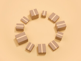 Taped cardboard boxes in the shape of a circle. Copy space for text.