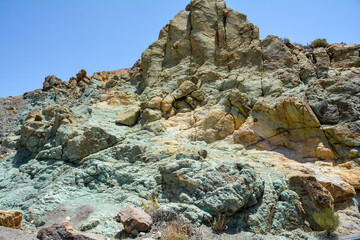 Fototapeta na wymiar Green rocks in El Teide National Park in Tenerife, Spain