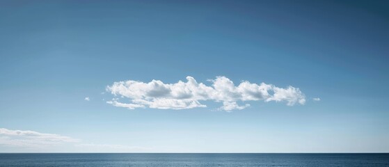 Serene Ocean View with Solitary Cloud