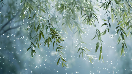 Green tree with raindrops falling on nature background