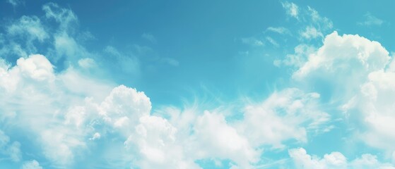 Fototapeta na wymiar Serene Blue Sky with Fluffy White Clouds Panorama