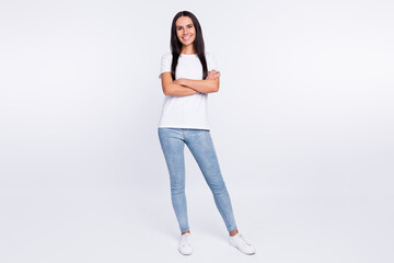 Full length body size photo smiling girl with folded hands in casual clothes isolated on white color background