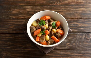 Beef meat stewed with potatoes, carrots and spices