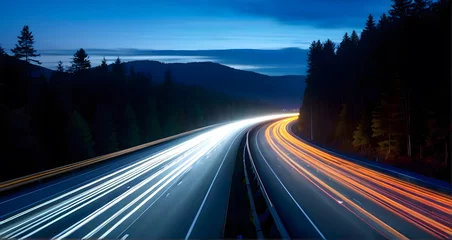 Fototapete Autobahn in der Nacht Long exposure night shot of busy highway with light trails nestled in tranquil forest