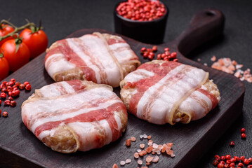 Round minced chicken or pork cutlet wrapped in bacon with salt, spices and herbs