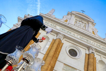 Holy Week Rites in Taranto. Brothers in procession. Procession of the Most Blessed Virgin of Our Sorrows. Puglia, Italy 