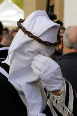 Holy Week Rites in Taranto. Brothers in procession. Procession of the Mysteries. Puglia, Italy