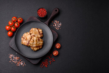 Round minced chicken or pork cutlet wrapped in bacon with salt, spices and herbs