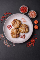 Round minced chicken or pork cutlet wrapped in bacon with salt, spices and herbs