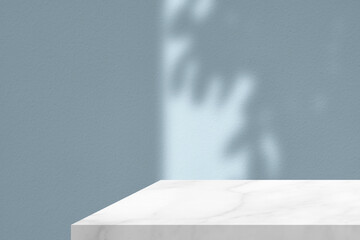 White Marble Table Corner with Light Beam, Shadow, and Spotlight on the Cyan Blue Concrete Wall...