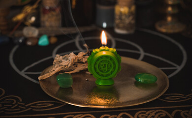 Healing of Anahata heart chakra. Green candles for mental health. Esoteric concept, cleaning of negative energy