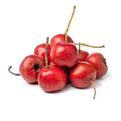 Heap of ripe fresh red hawthorne berries close up isolated on white background