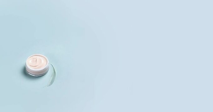 Cosmetic product isolated on a blue background without logo. Cosmetic jar for face or body cream. Natural cosmetics for branding layout concept. Cosmetics and beauty .Copy space. Generative AI