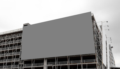 Mock up grey background billboard on parking lot building. Clipping path for mockup