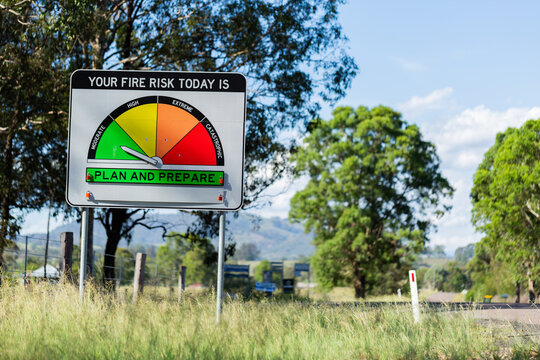 Fire danger rating sign on rural roadside in NSW Australia reading moderate plan and prepare 