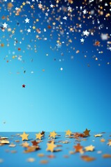 Blue background with gold and silver stars falling