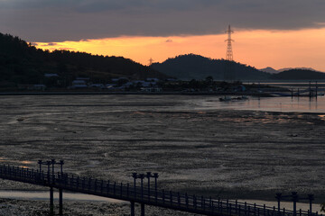 View of the seaside during sunset