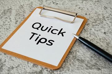 Quick tips text on notepad. Business quick tips concept