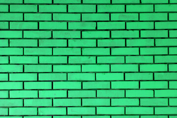 Horizontal green brick wall. Old textured surface background or cover element. Web banner.