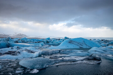 Jökulsárlón Glacier Lagoon. Iceland tourism in winter, Glacial icebergs in a lagoon with...