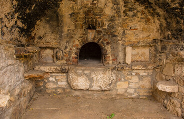 The interior of an 18th century Istrian stone bread oven in Premantura in Istria, Croatia. There were many in the past, but this is the only one remaining in town today - obrazy, fototapety, plakaty