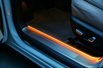  A cars door sill with illuminated branding