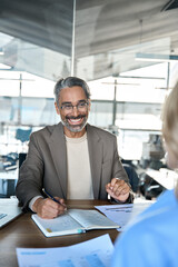 Happy middle aged professional business man executive hr, bank manager, lawyer or financial advisor...