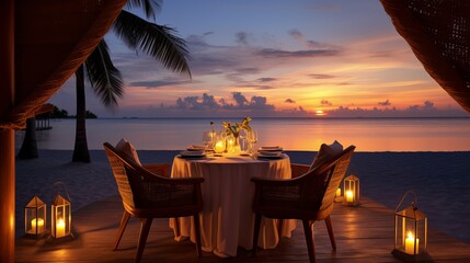 A Table Set up for a romantic meal on the beach with lanterns and chairs and flowers with palms and sky and sea in the background - obrazy, fototapety, plakaty