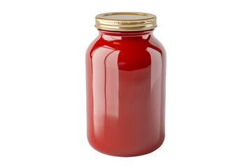 Red Glass Jar With Gold Lid. A red glass jar with a shiny gold lid sits on a countertop, reflecting the light.