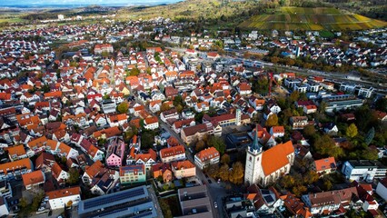Aerial view of the city Metzingen in Germany on a sunny day in fall