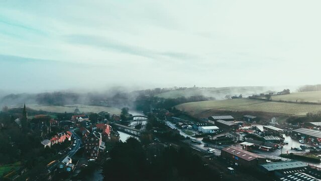 Ruswarp is a pretty village that lies in the scenic Esk Valley, just one mile south of Whitby. Misty Yorkshire landscape scene. Coastal winter setting