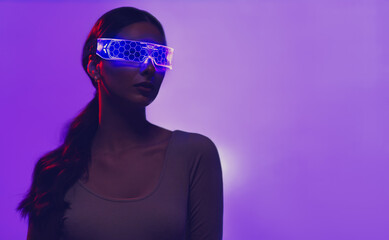 Disco girl in neon glasses on a purple background. - 738241928