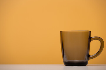 Glass mug mockup, close-up, yellow background. - 738246984