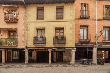 Frontal image of facades of very old and historic houses with boulevards on the main street of...
