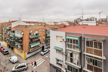 Modest residential residential buildings at an urban street intersection