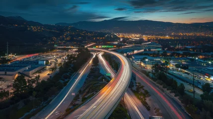 Foto op Plexiglas A long exposure photo of a highway at night. © ANStudio