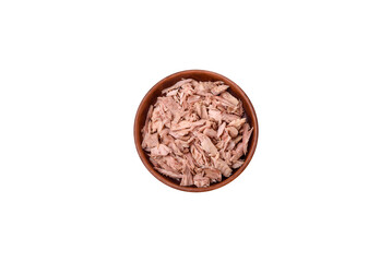 Delicious canned dietary tuna meat with salt, spices and oil