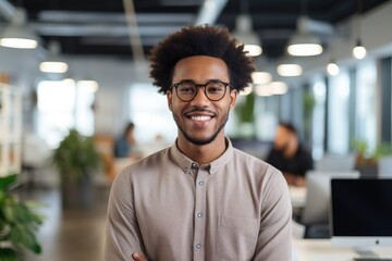 Obraz premium Portrait of a young male professional in modern office space