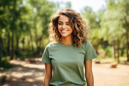 Smiling Girl wearing green T-Shirt Mockup on white studio background. Generative Ai