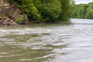 river, mountainous terrain, cloudy day, the beginning of the summer period, walking in the bosom of...