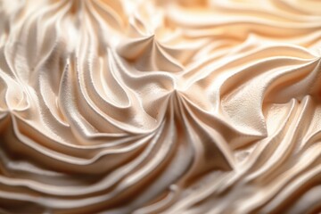 Luxurious closeup view of cream with a golden hue, its peaks and valleys creating a mesmerizing landscape of smooth, whipped texture