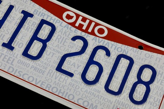 Vehicle registration plates of Ohio. &ldquo;Ohio Pride&rdquo; design was used by all vehicles in 2013-2021. License plates are issued by the Ohio Bureau of Motor Vehicles (BMV). Cleveland, Ohio, USA - February 1