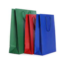 Colorful paper shopping bags isolated on white