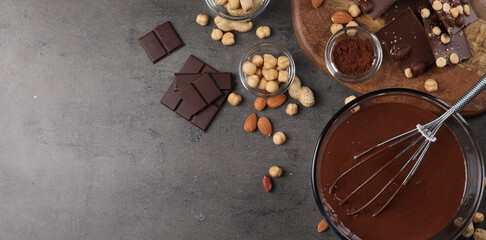 Making tasty chocolate cream or spread. Ingredients on grey table, flat lay. Banner design with...