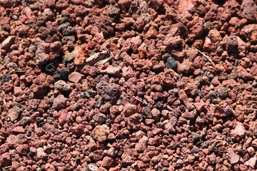 Red volcanic rock texture close up