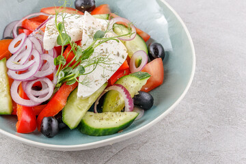 Greek salad on a stone background studio food photo 4