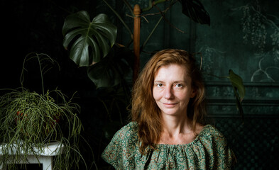 beautiful woman portrait in green room