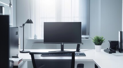 Minimalist Workspace with Single Computer Monitor on White Desk