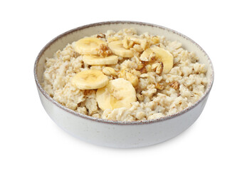 Tasty oatmeal with banana and walnuts in bowl isolated on white